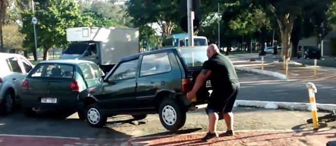 Brazilian strongman moved a wrongly parked car