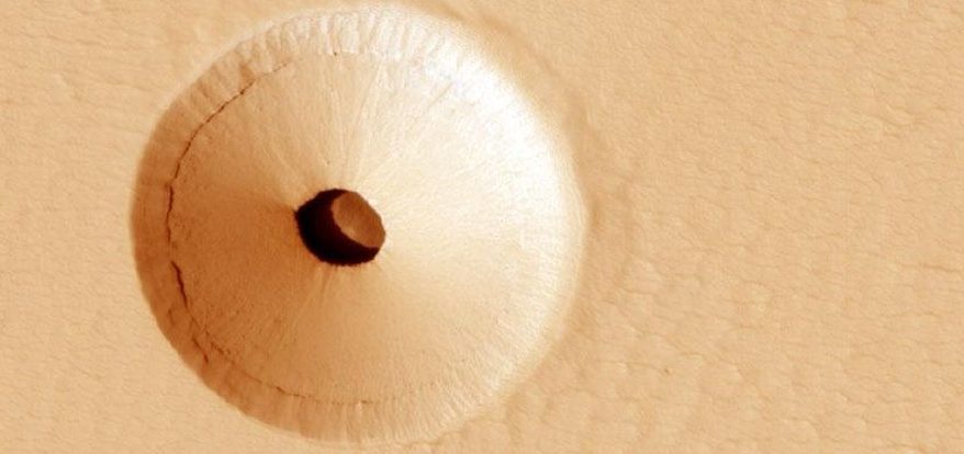 What is this strange hole on Mars? 