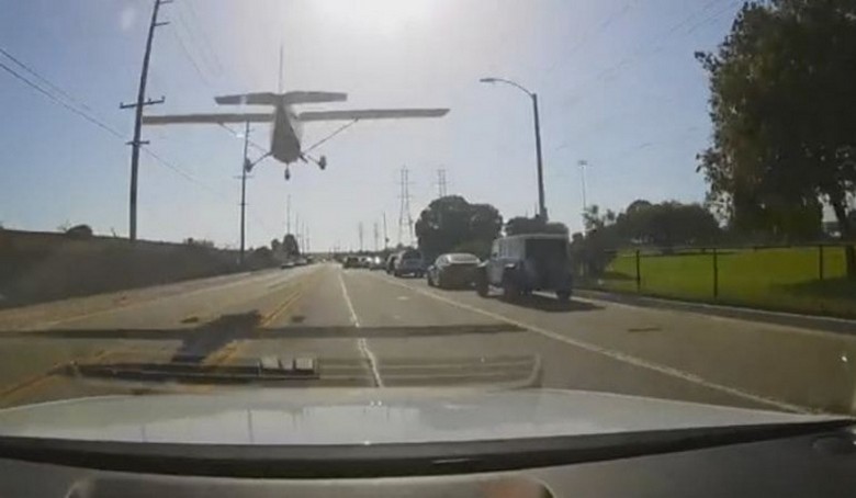 The girl in the role of a novice pilot was able to masterfully land the plane on the highway