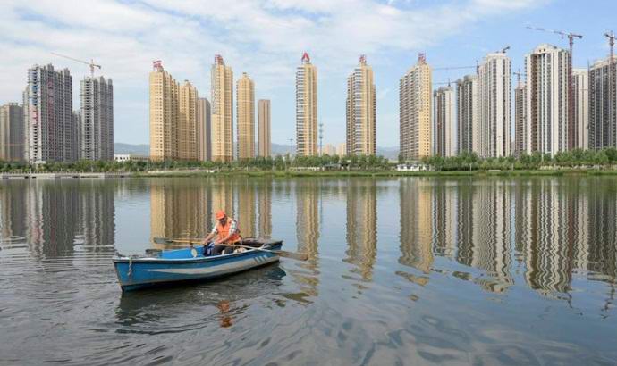 Why are ghost towns being built in China?