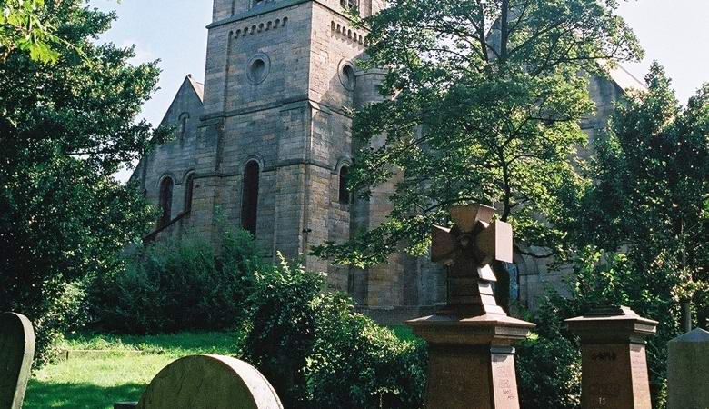 The spirit of a 17th-century soldier is captured soaring above his grave