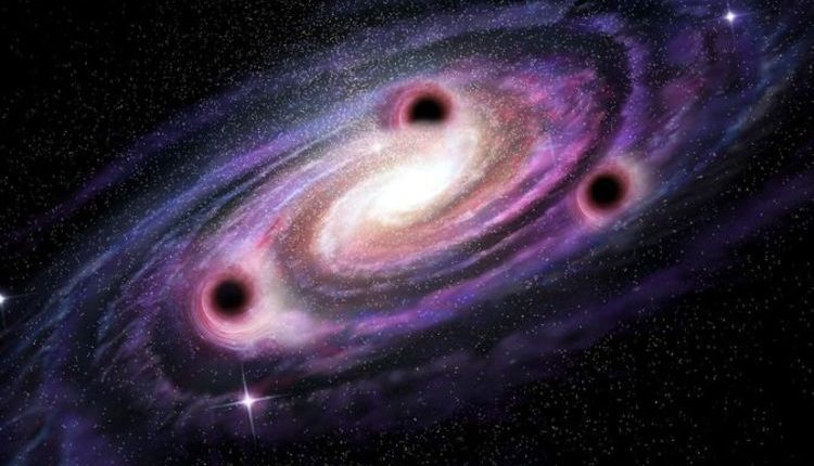 Physicists: Three interacting black holes are enough to break the time reversal symmetry 