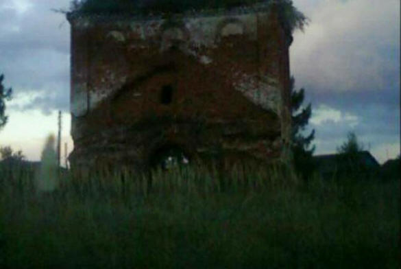 The photographer photographed the ghost of a girl on the background of the old church