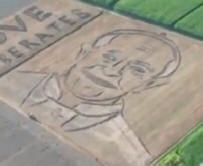 The artist plowed a giant portrait of the Pope with a tractor. Video