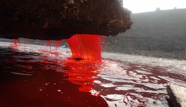 The Chinese creek turned a bright blood red color