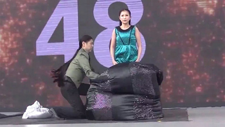 The Malaysian illusionist broke her own high-speed dressing record
