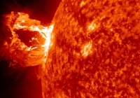 A powerful magnetic storm on Earth is triggered by a solar flare. 