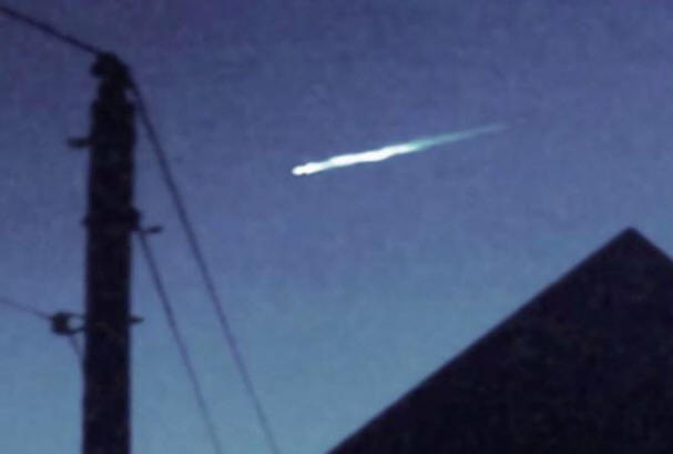 Witnesses photographed a falling object with a UFO over California