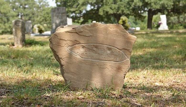 A reward of one thousand dollars has been appointed for the return of the tombstone from the alien's grave