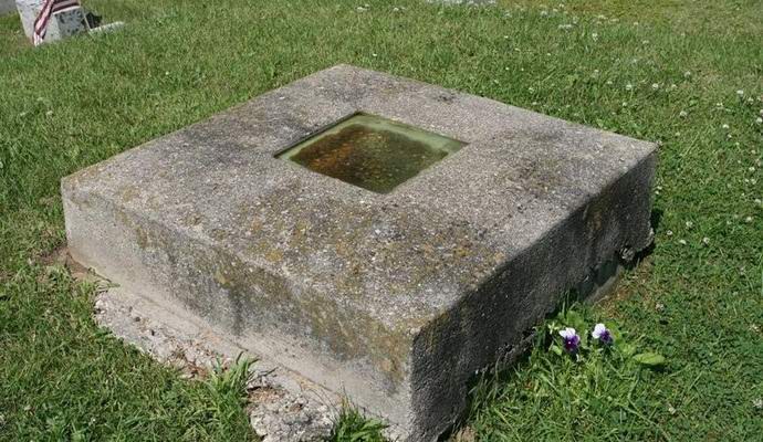 Unusual grave with a window