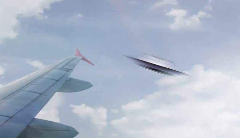 Unusual UFO shot from the window of an airplane