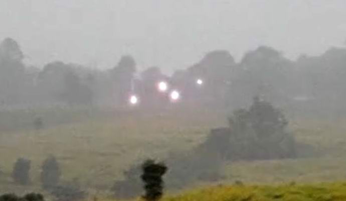 UFOs dance around a British field