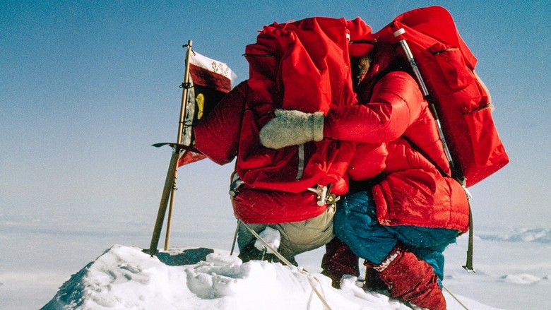 To conquer the mountain with your last name first - and this, it turns out, is possible in our difficult world