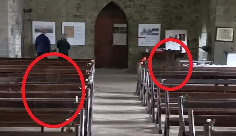 Otherworldly human figures in the church accidentally hit the video