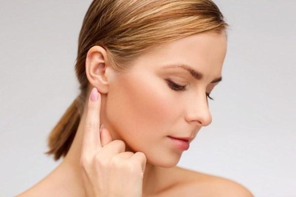 sign a pimple behind the ear 