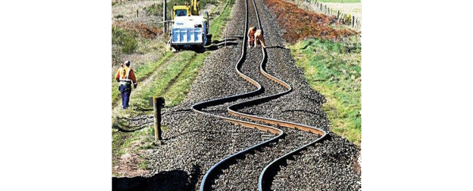 The aliens curved the railroad track