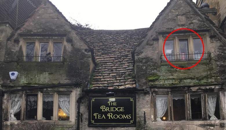 The ghost appeared in the window of an old teahouse