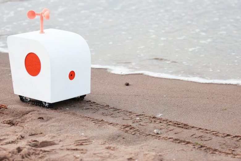 Robot poet writes poetry in the sand