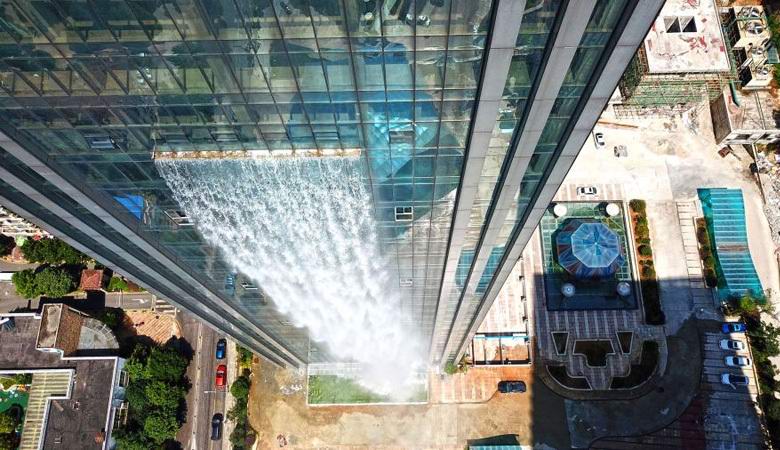 The largest man-made waterfall poured from a Chinese skyscraper