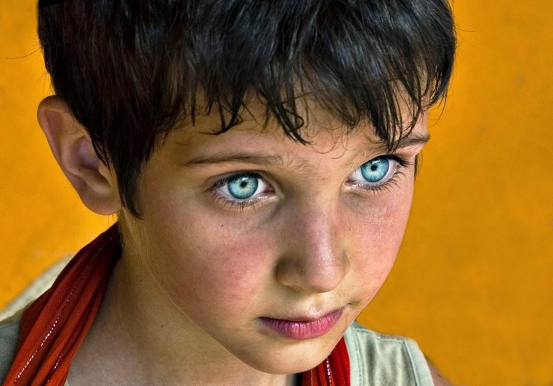 Strange children with blue eyes