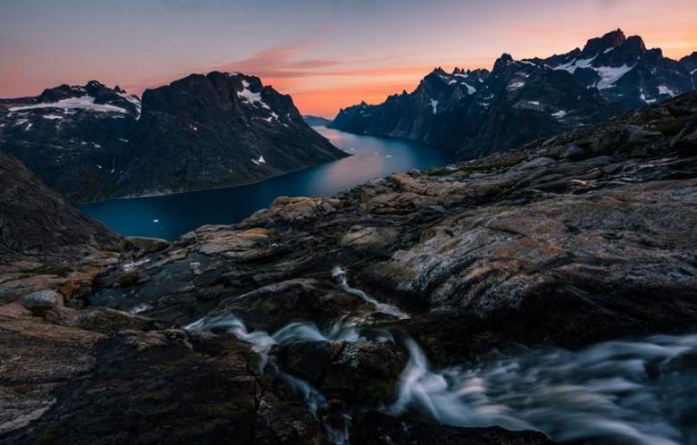 Scientists have discovered dark areas on the ice sheet of Greenland, under which snow melts intensively