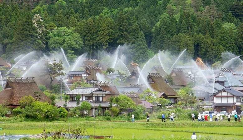 A unique fire system has turned the Japanese village into one large fountain.