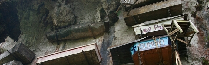 A unique cemetery with hanging coffins