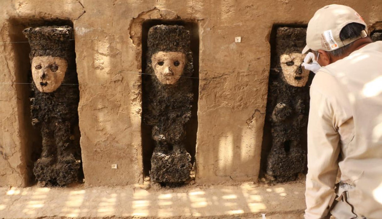 Wooden figures dug up in Peru