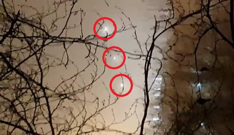 A string of UFOs flew in the evening English sky