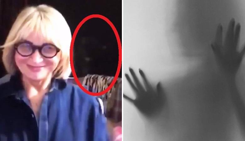 A mysterious figure flew behind a psychic during a video chat