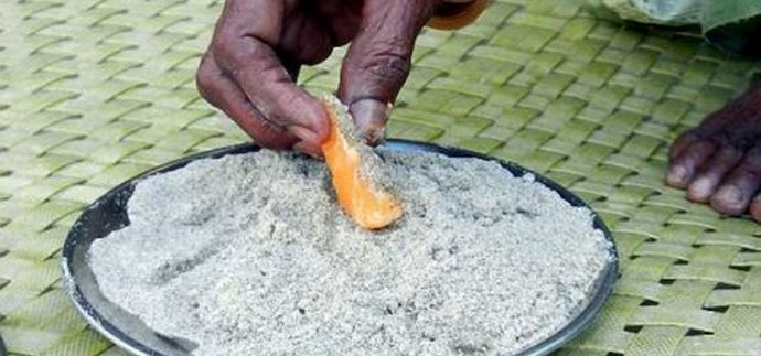 A woman who eats a kilogram of sand every day for 80 years