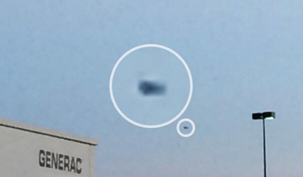 A resident of the United States photographed a black UFO